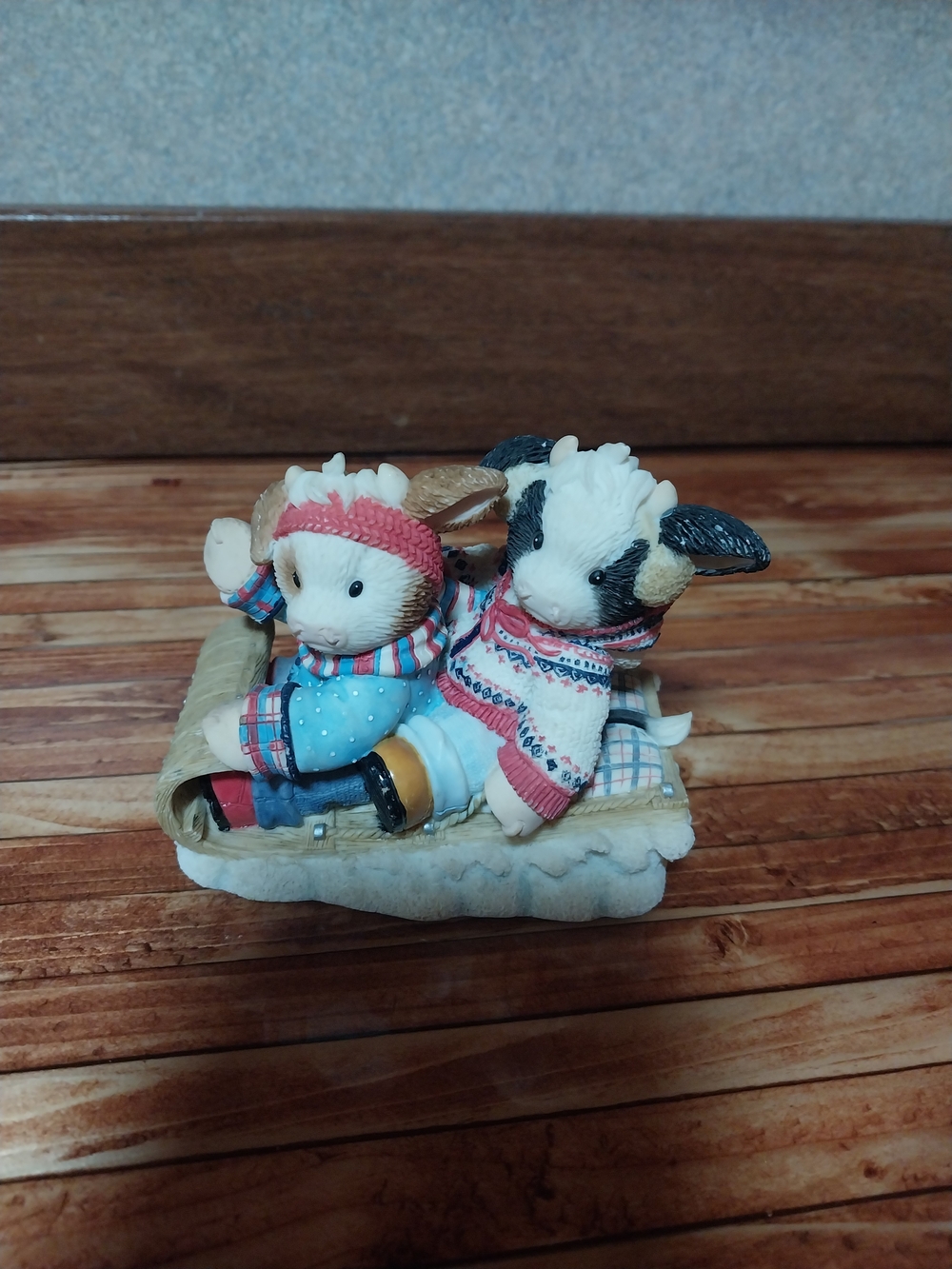 Hand-Painted Cream and Black Lambs Figurine - Cozy Sled Scene